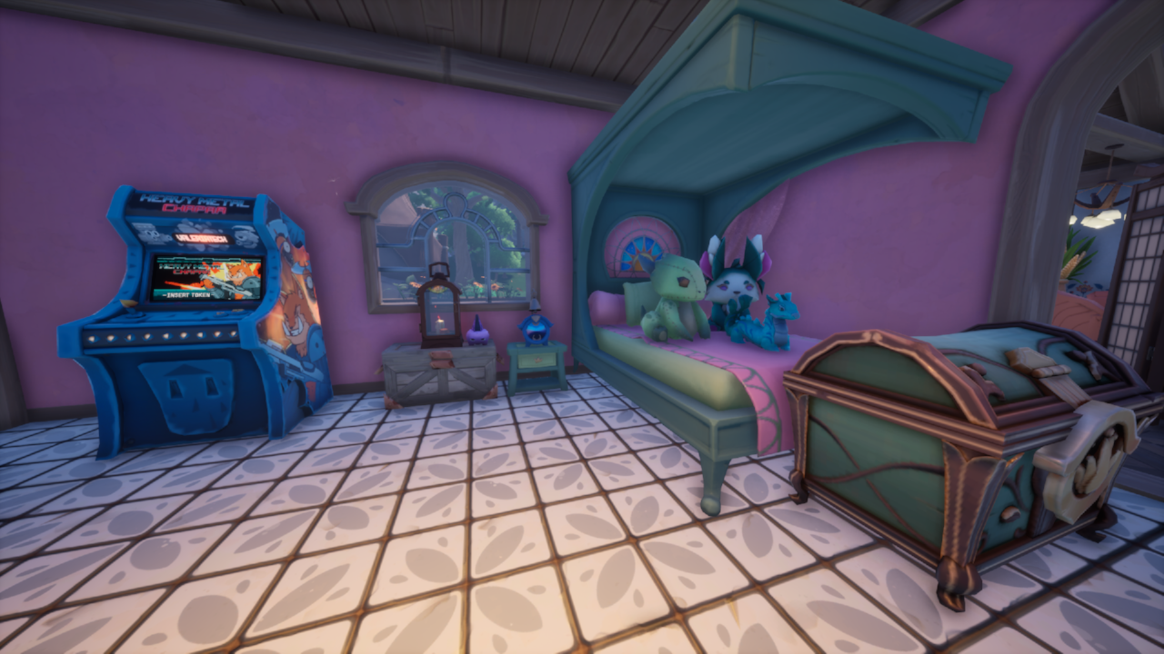 pink and blue bedroom with bed and arcade machine